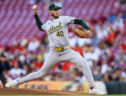 A’s go deep twice in 7th, narrowly fend off Reds
