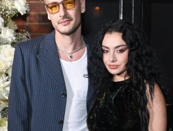 Charli XCX and The 1975’s George Daniel Pack on PDA During Rare Outing