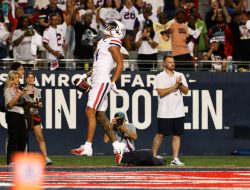 Tetairoa McMillan (304 receiving yards) helps No. 21 Arizona outlast New Mexico