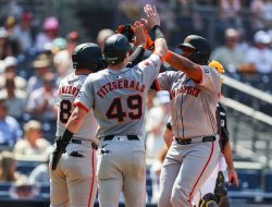 Giants slug four homers to edge Padres