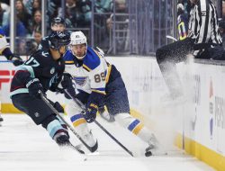 Blues streak to 3 straight goals, edge host Kraken in season opener