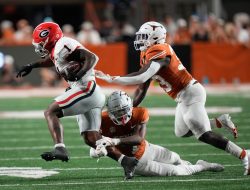 Top 25 roundup: No. 5 Georgia rumbles past No. 1 Texas