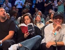 Aubrey Plaza Pretends To Read Book During WNBA Finals
